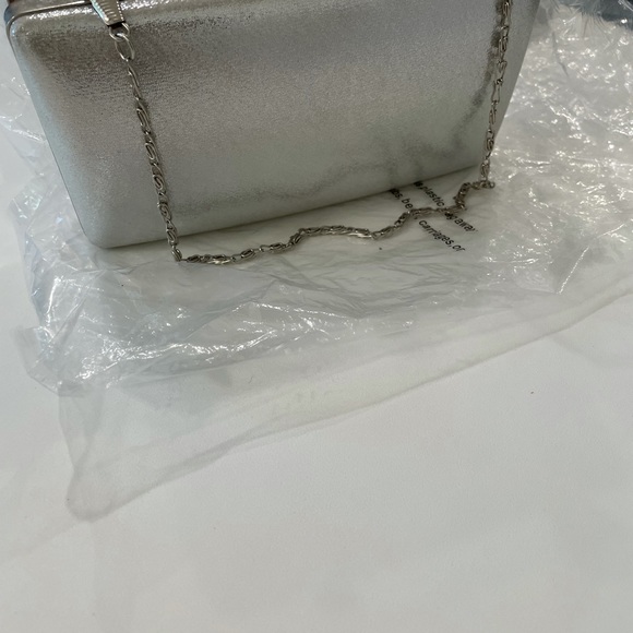 Brand new clutch/purse turns into both. No stains. - Picture 3 of 3